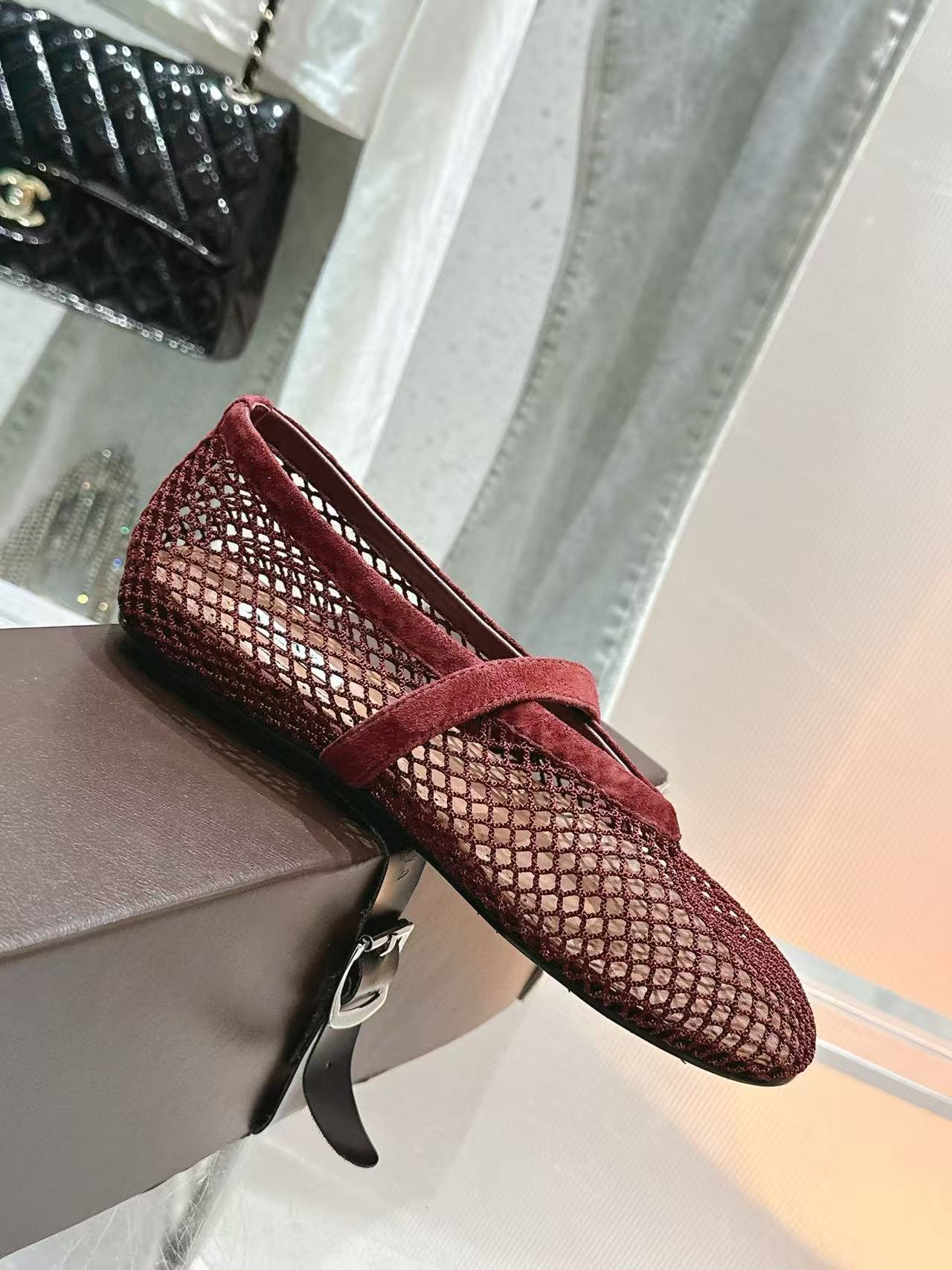 UA ALAÏA BALLET FLATS IN FISHNET