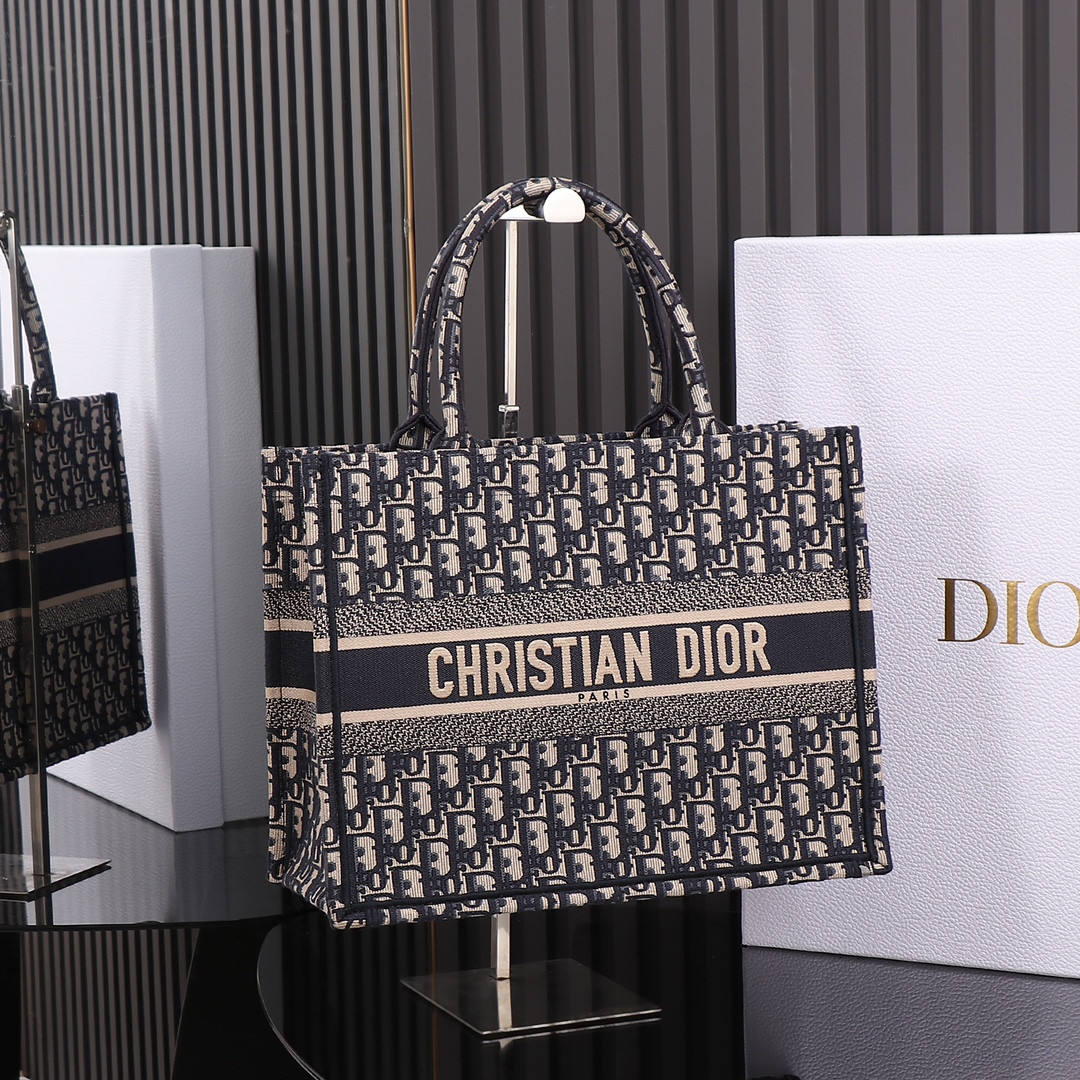 medium D*or book tote  ecru and blue D*or oblique embroidery 14 x 11 x 6.5 inches